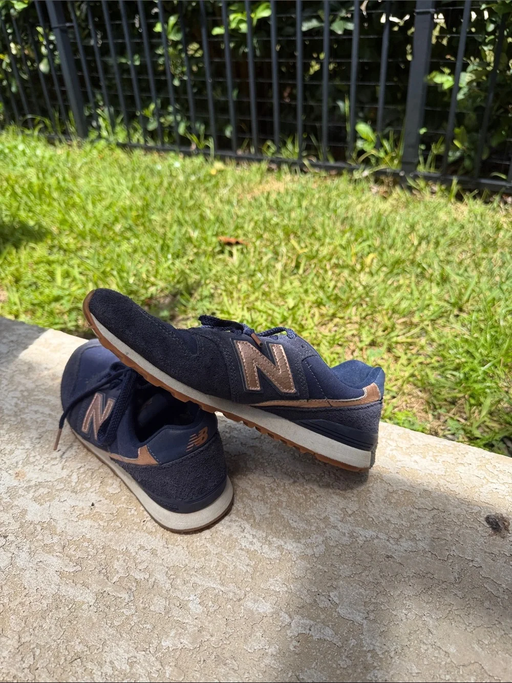 New Balance Women's Navy Sneakers with Metallic Rose Accents